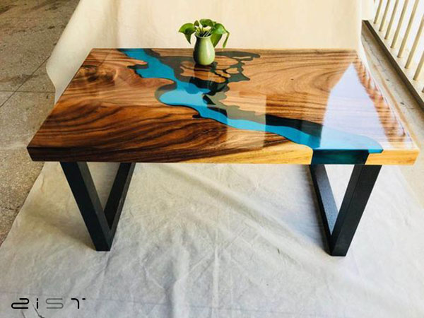 میز جلو مبلی شیک و خاص چوب و رزین یک انتخاب عالی برای منزل شما است