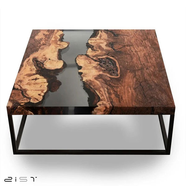 در این تصویر یک مدل میز ناهار خوری چهار نفره مربع چوبی با پایه های فلزی را مشاهده میکنید