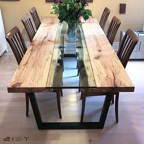 در این تصویر یک مدل میز ناهار خوری 8 نفره جدید چوب و شیشه را مشاهده میکنید
