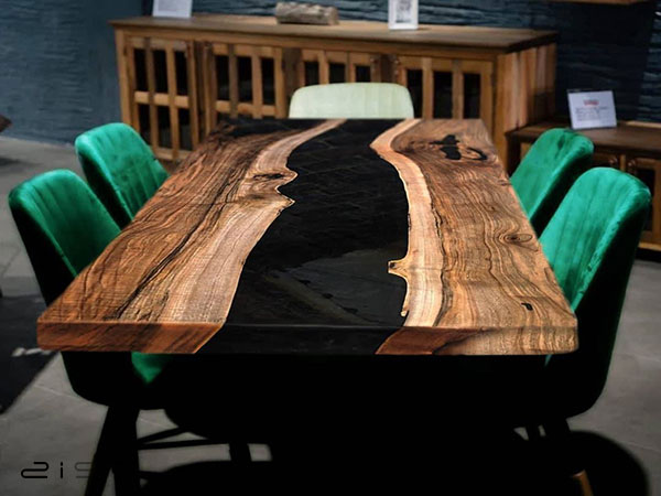 در این تصویر یک نمونه میز ناهار خوری طرح چوب و رزین مستطیل شکل را مشاهده میکنید