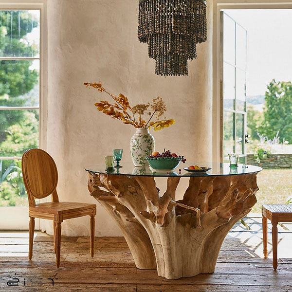 در این تصویر یک مدل میز ناهار خوری چوبی مدرن با شیشه را مشاهده میکنید