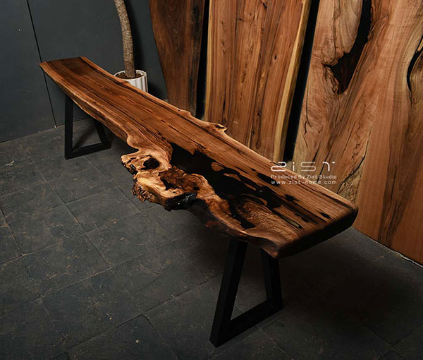 یکی دیگر از انواع جدیدترین مدل های میز تلویزیون میزهای چوب و فلزی هستند که جذابیت بسیار زیادی دارند