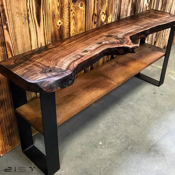 در این تصویر یک مدل میز تلویزیون چوب و فلز امروزی را مشاهده میکنید